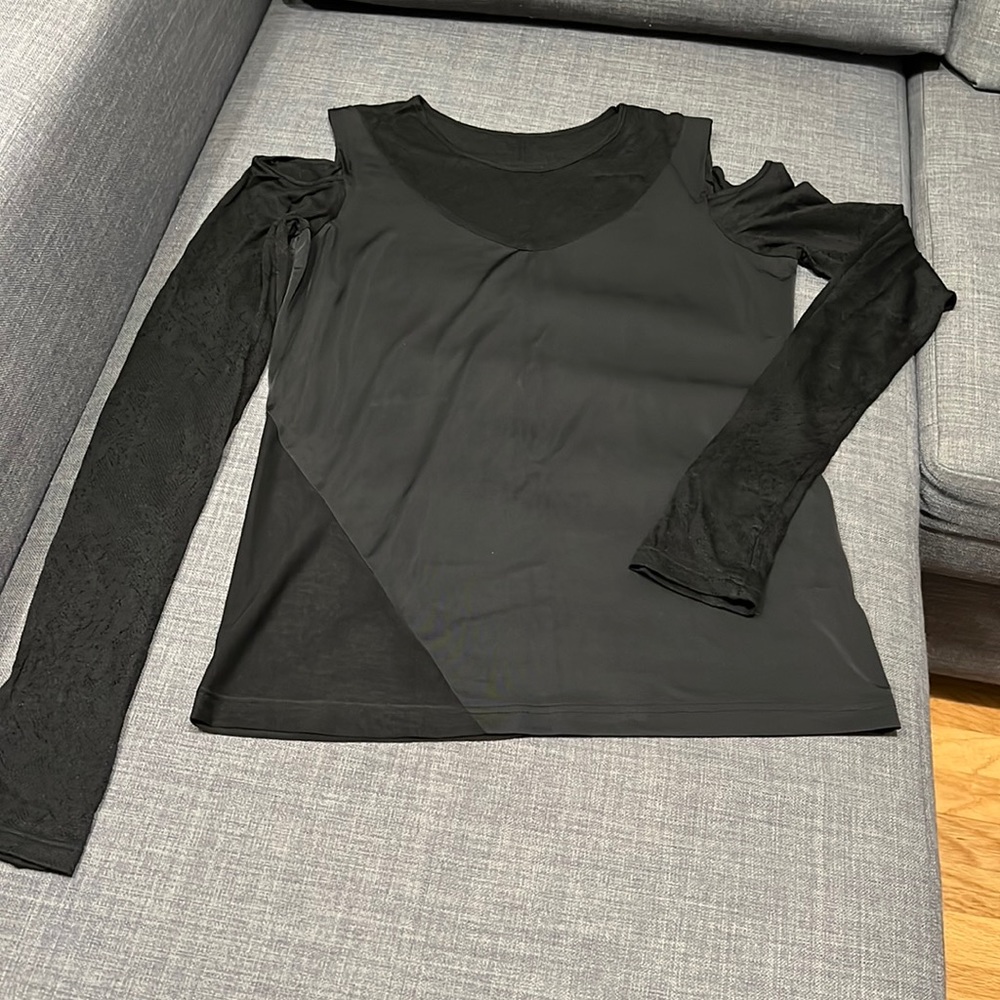 Women’s cold shoulder top embellished with lace and sheer detailing